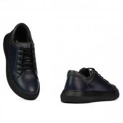 Buty sportowe 943 indigo kombinowany