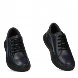 Buty sportowe 943 indigo kombinowany