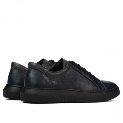 Buty sportowe 943 indigo kombinowany