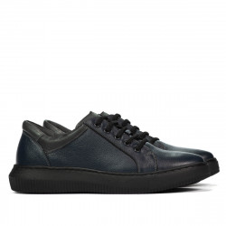 Buty sportowe 943 indigo kombinowany