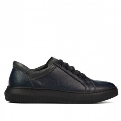 Buty sportowe 943 indigo kombinowany
