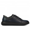 Buty sportowe 943 indigo kombinowany